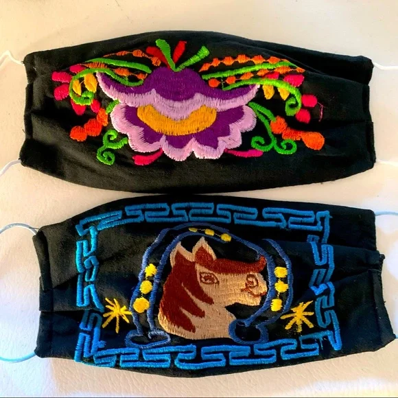 Two embroidered face masks