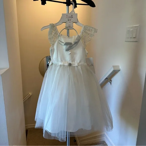 Biscotti Flower Girl White Dress with Lace Shoulders & Matching Bow Headband