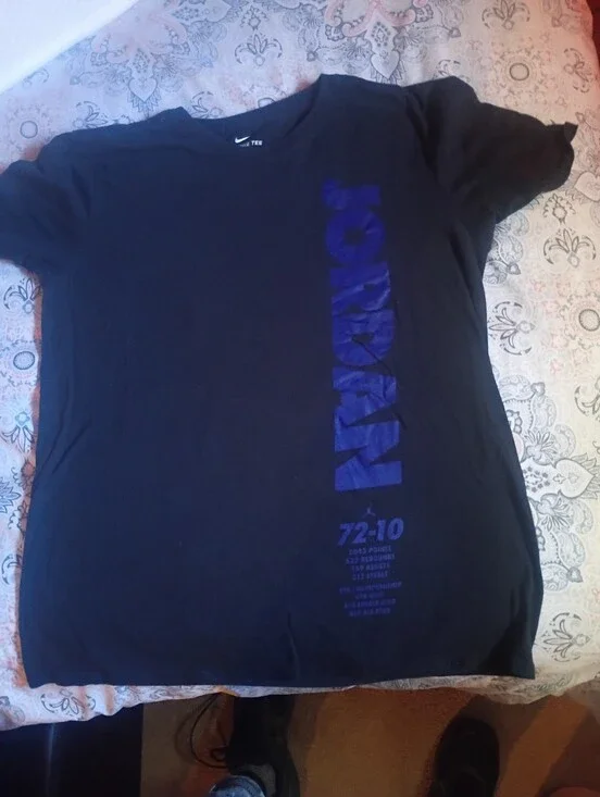 Nike Air Jordan Men’s Black T-Shirt with Vertical Blue 'Jordan' Graphic