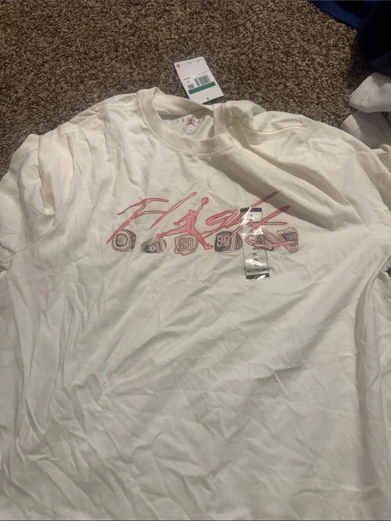 Jordan Cream Short Sleeve Tee with Pink 'Flight' Graphic