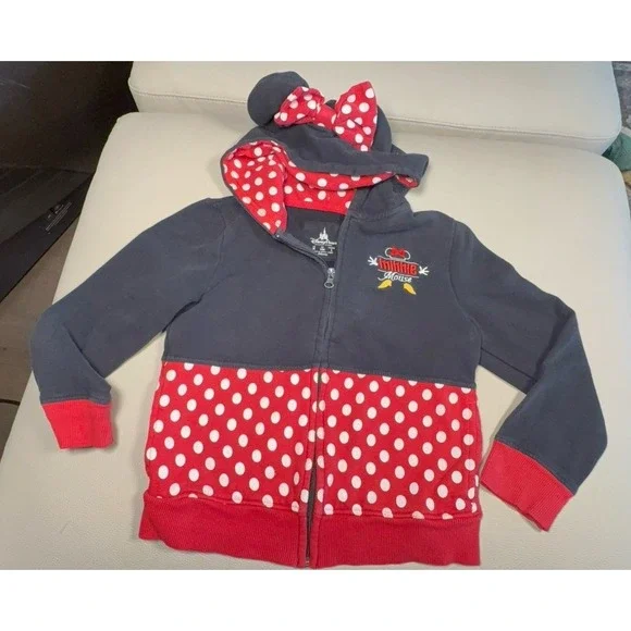 Girls medium (8) Disney Parks Minnie Mouse hoodie zip jacket. Well worn but stil