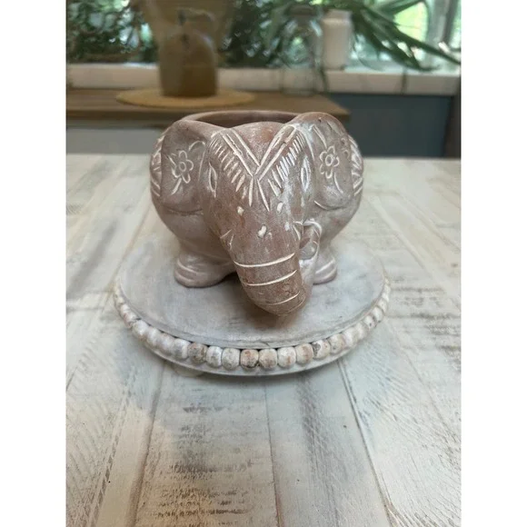 Terracotta white washed elephant planter.‎