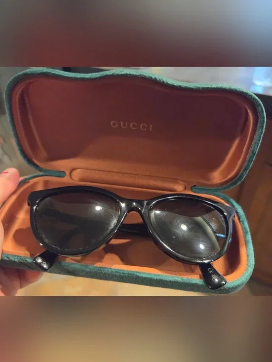 Gucci Black Oval Sunglasses with Case