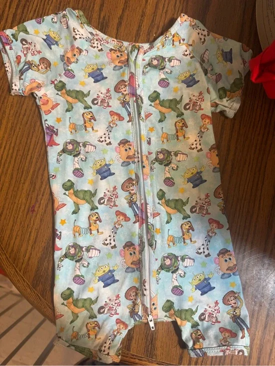 Light Blue Toy Story Short Sleeve One-Piece bamboo Romper - Kids