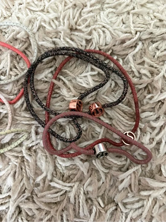Lululemon hair tie bundle Set - Coral, Black, Olive, Cream lot of 7