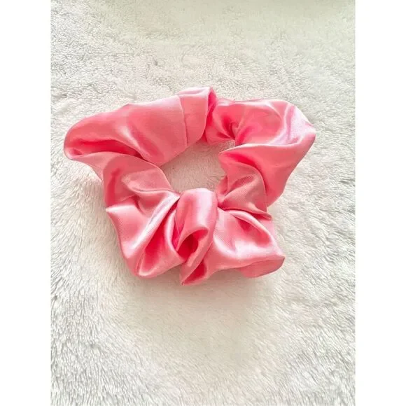 Bright pink color satin hair scrunchie
