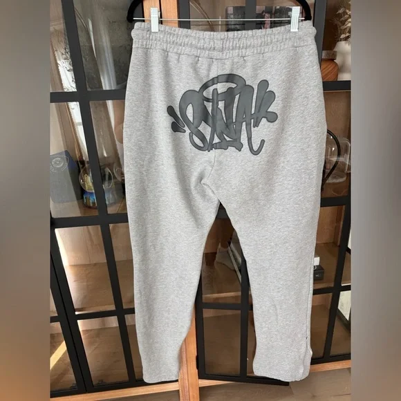 Syna World Logo joggers sweatpants tracksuit graffiti zipper drawstring