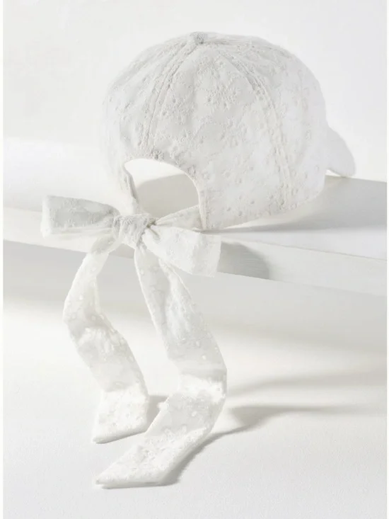 Anthropologie Eyelet Baseball Cap with Bow Back in White. One size. Brand new!