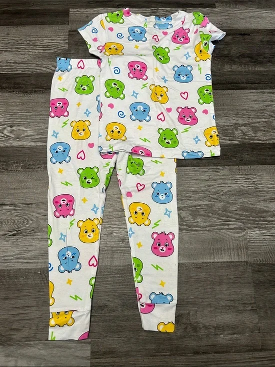 Care Bears White Pajama Set with Pink, Blue, Green, and Yellow Bears