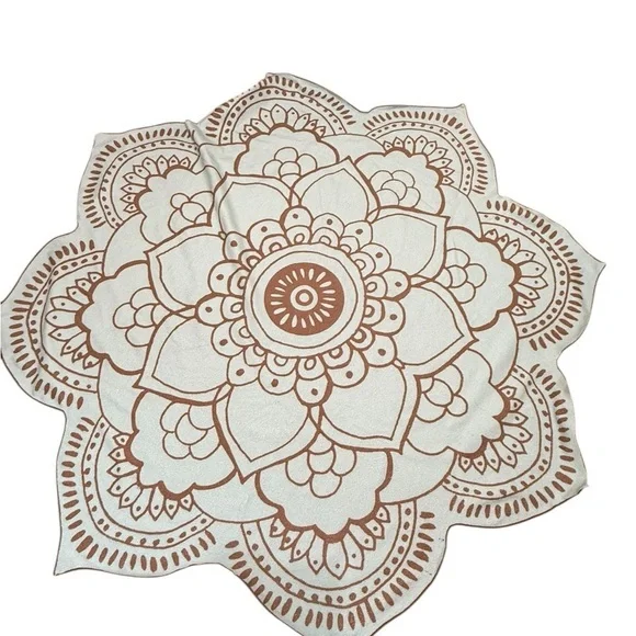Vix Paula Hermanny lotus flower shaped beach towel in a blue and brown color
