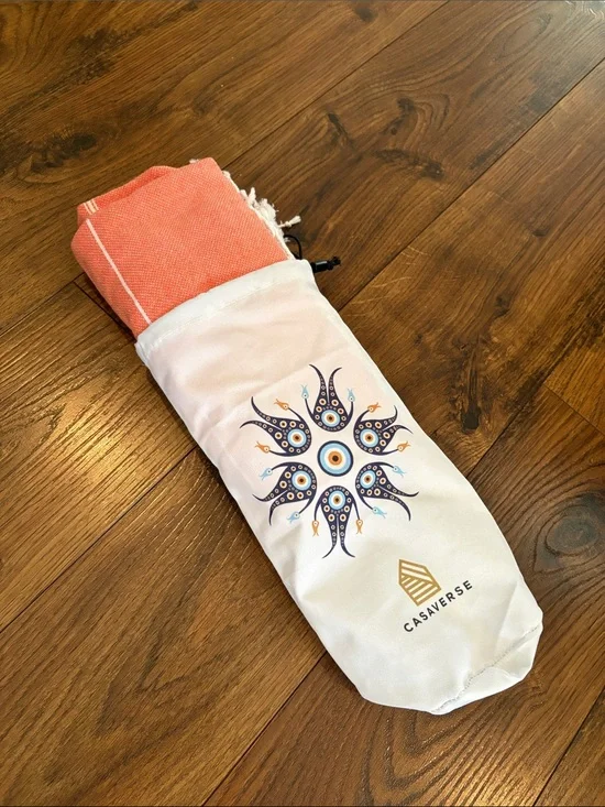 New Casaverse Coral Beach Towel with White Logo Pouch