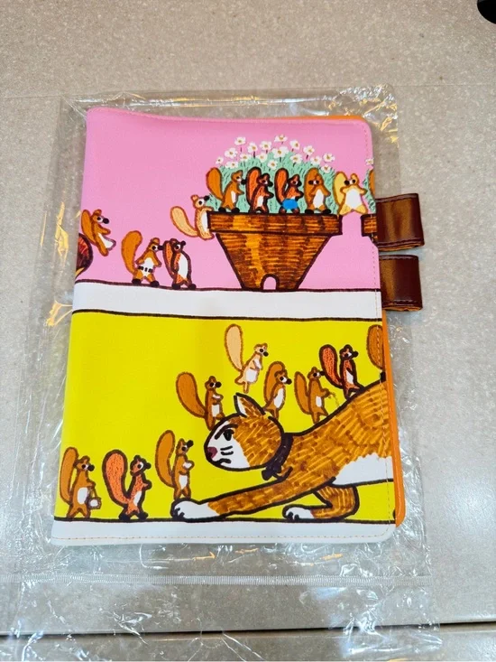 Hobonichi Cousin Cover.  100% orange: Where’s the squirrel going?