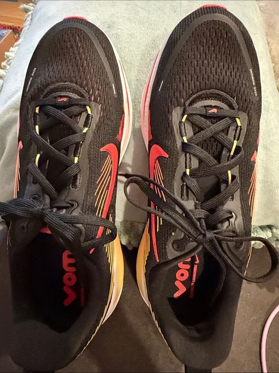 Nike Black Running Sneakers with Red and Yellow Accents