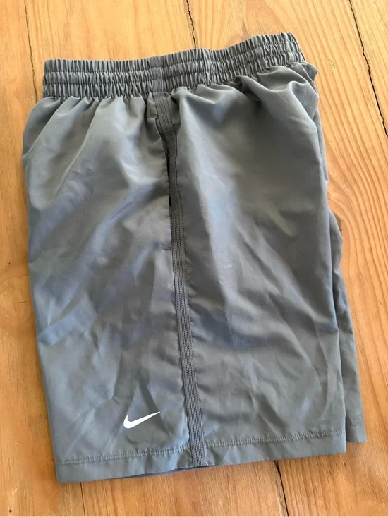 Nike Light Gray Athletic Shorts with White Swoosh
