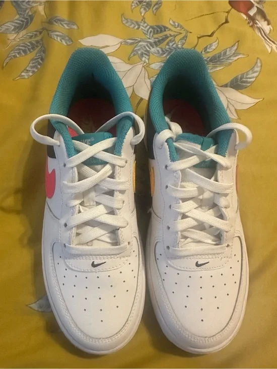 Nike Kids White Low-Top Sneakers with Teal and Pink Accents