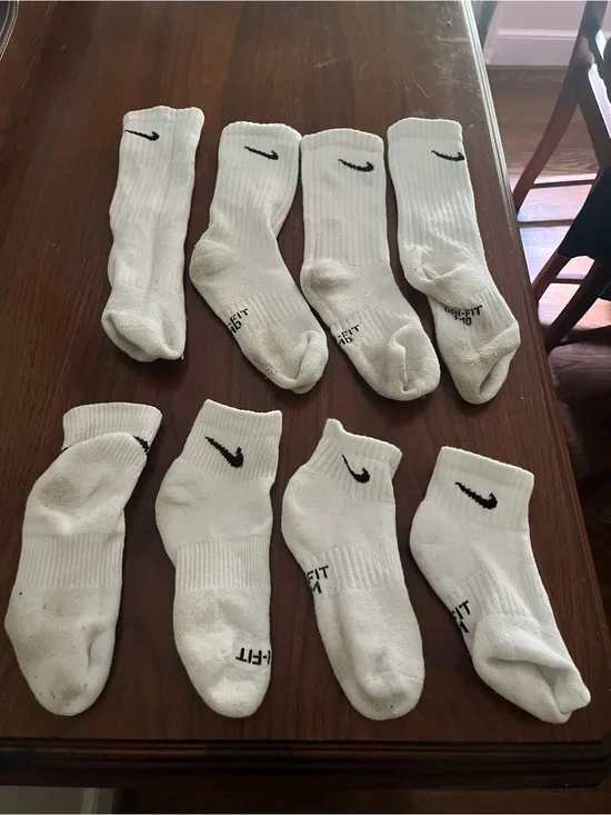 4 sets of kids white Nike socks