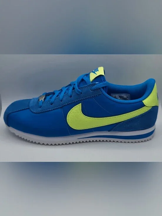 Nike Kids Blue Sneakers with Yellow Swoosh