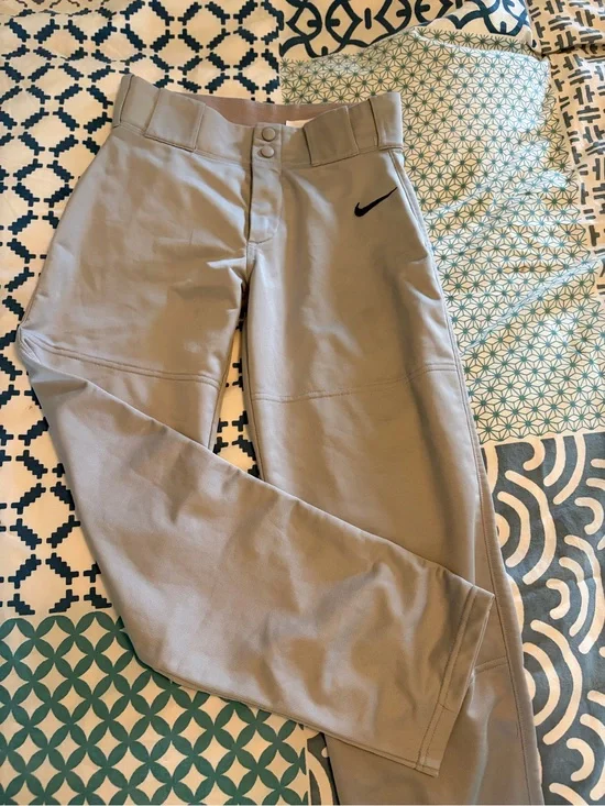 Nike Youth Large Low Waist Performance/Baseball Pants in Gray with Black Swoosh.