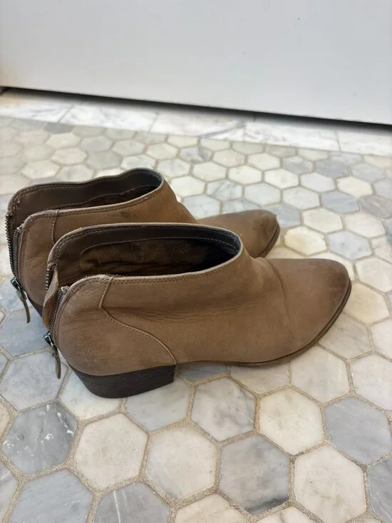 Blondo waterproof ankle booties featuring an almond-toe profile