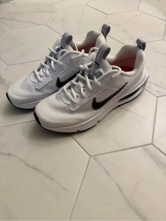 Nike White Sneakers with Black Swoosh and Gray Pull Tabs
