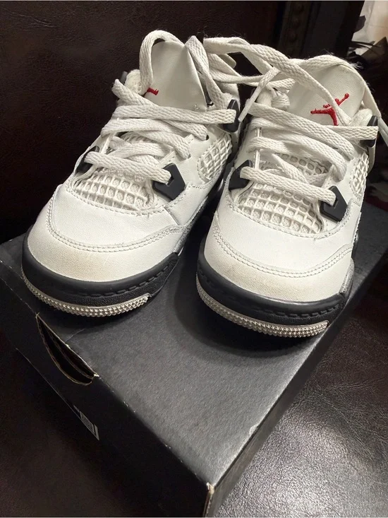 Nike Kids White Sneakers with Black Soles and Red Jumpman