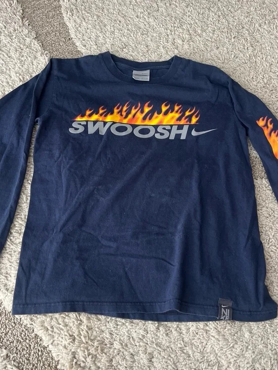 Vintage Nike Kids Navy Long Sleeve Tee with Flame 'Swoosh' Graphic