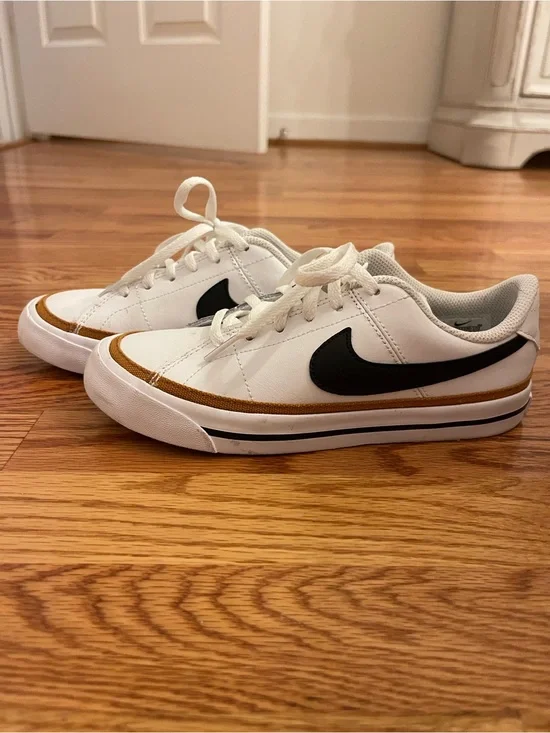 Nike Court Legacy White Low-Top Sneakers with Black Swoosh and Gold Trim