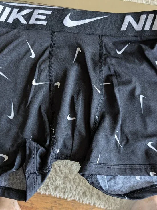 A pair of boy's Nike Dri-Fit Boxer Brief with logos