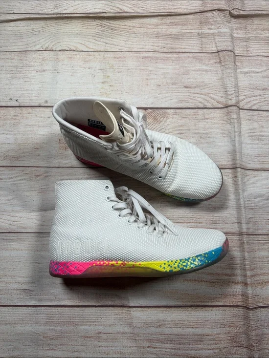 NOBULL‎ white high-top trainers featuring a vibrant multi-color glitch sole