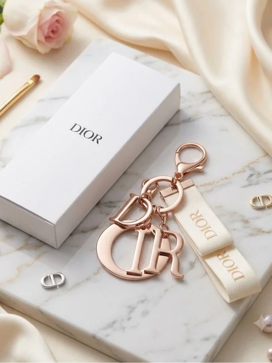 DIOR keychain Gold & Cream Logo Keychain with Ribbon new in box