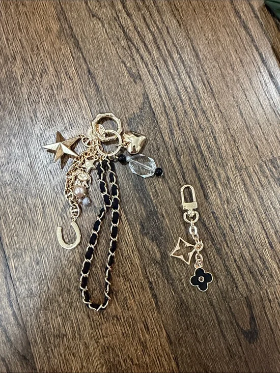 Set of 2 bag charms- Gold and Black Charm Keychain with Star & Flower Accents
