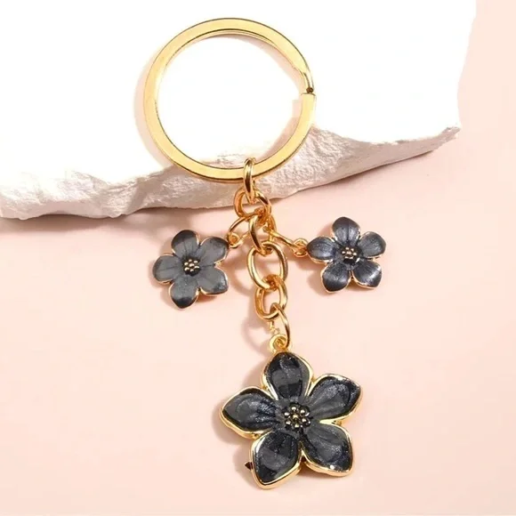 3 For $35 Black Enamel Plumeria Flower Keychain with Gold Tone Metal