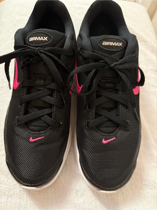 Nike Women's Black Athletic Shoes with Pink Swoosh