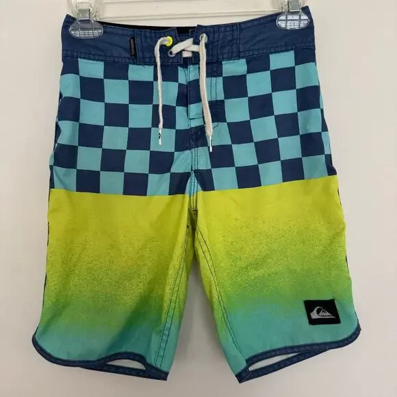 Quiksilver Board Shorts Featuring a Checkerboard Top and a Gradient Bottom