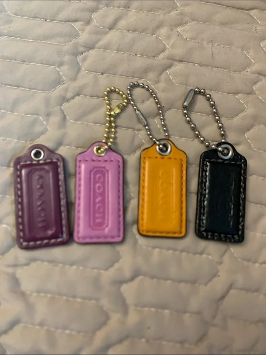 Bundle 4 Coach Leather Mini Tag Keychain Set — Plum, Pink, Mustard, Black