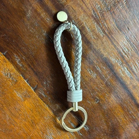 Kempinski Hoteliers Braided Leather Loop Keychain Grey Gold Tone Logo Charm 5.5