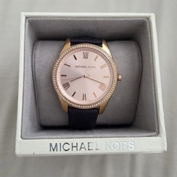 Michael Kors Rosegold Dial With A Quilted Plum Leather Strap
