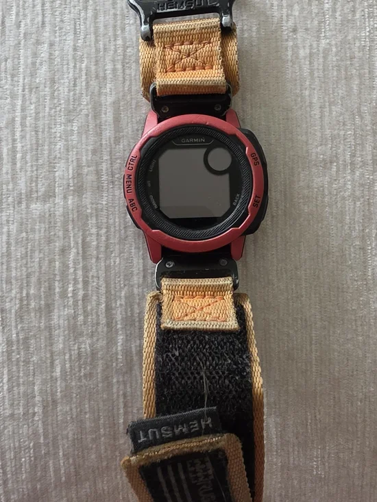 garmin red GPS sports watch with yellow nylon strap