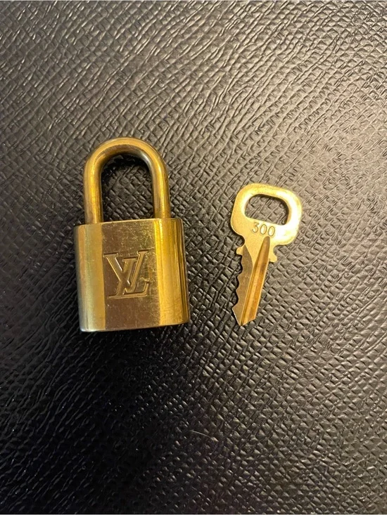Louis Vuitton Brass-Tone Padlock and Key. #300