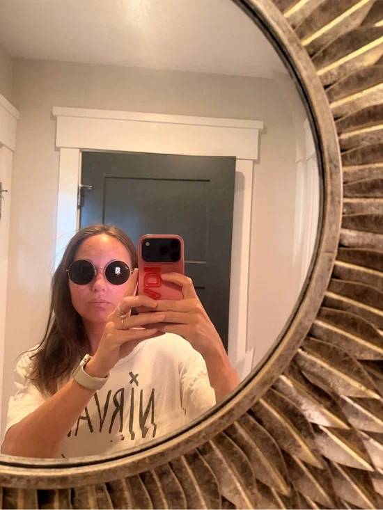 Raybans: Ja-Jo style. Rose gold frame. Black lenses I believe.