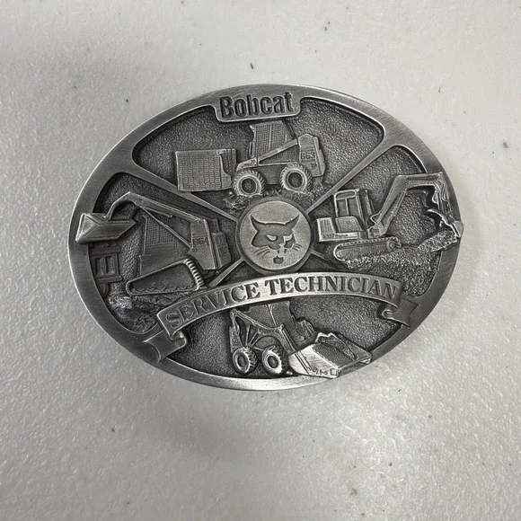 vintage Bobcat Service Technician belt buckle features a pewter construction