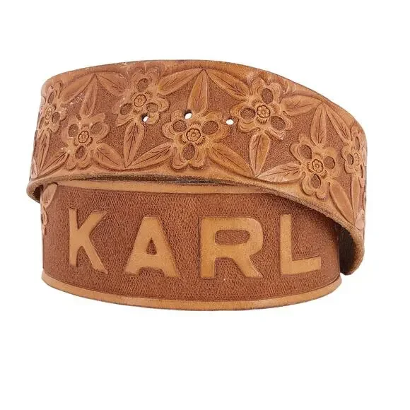 floral tooled wide leather belt personalized with Karl