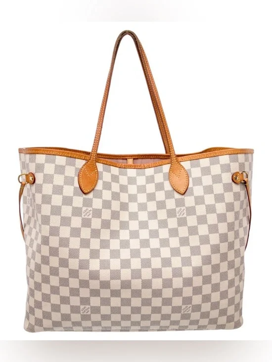 Louis Vuitton LV Neverfull MM tote is crafted from white and blue Damier Azur