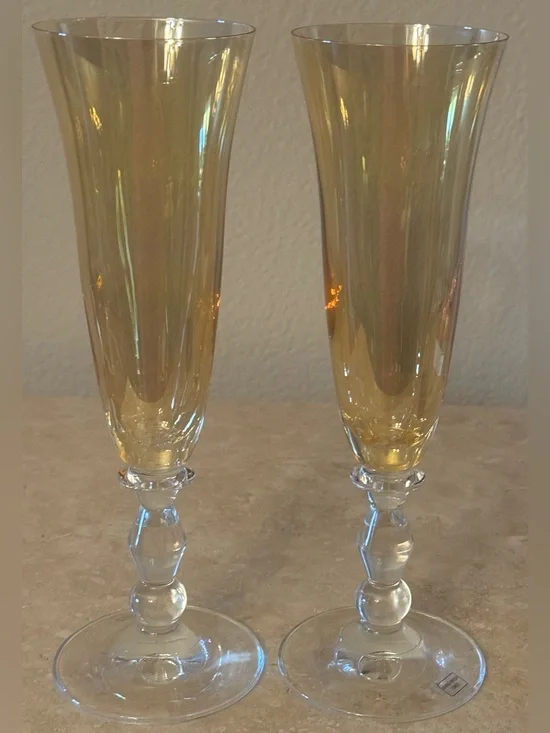 Pair of Vintage Iridescent Amber Fluted Champagne Glasses with Clear Stem.