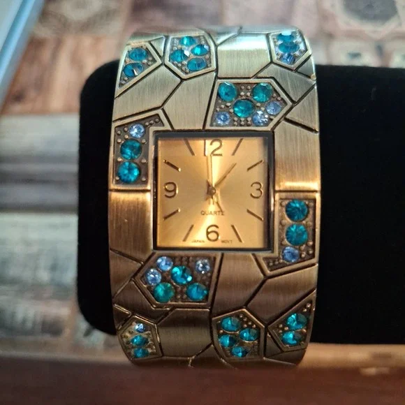 Womens Brass Tone Cuff Watch With Blue Crystals. Pre-Owned.