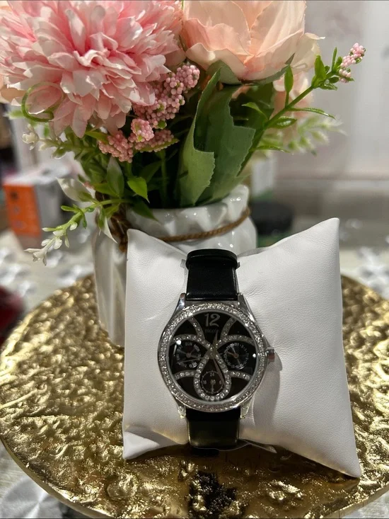 633. NWOT Nicole Miller Black & Crystal Watch‎ with genuine black leather band.