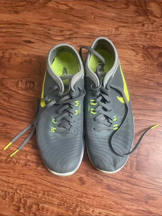 Nike women’s Gray & Neon Yellow Training Sneakers
