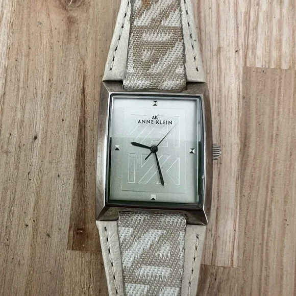 Anne Klein ladies rectangular silver tone dress watch NEW BATTERY