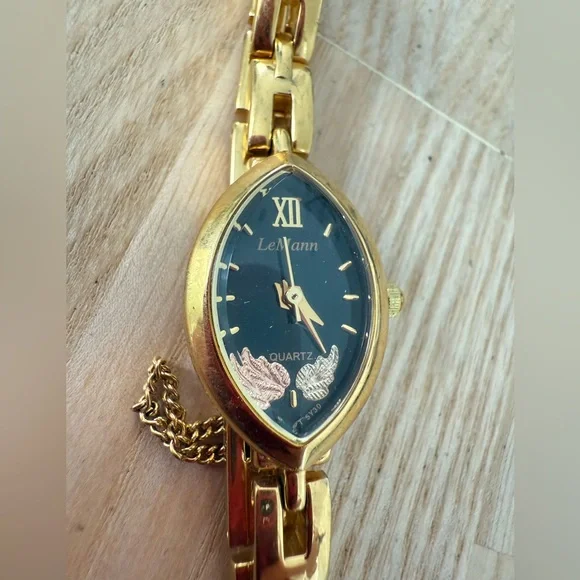 Lemann for black hills gold ladies black dial gold tone watch NEW BATTERY