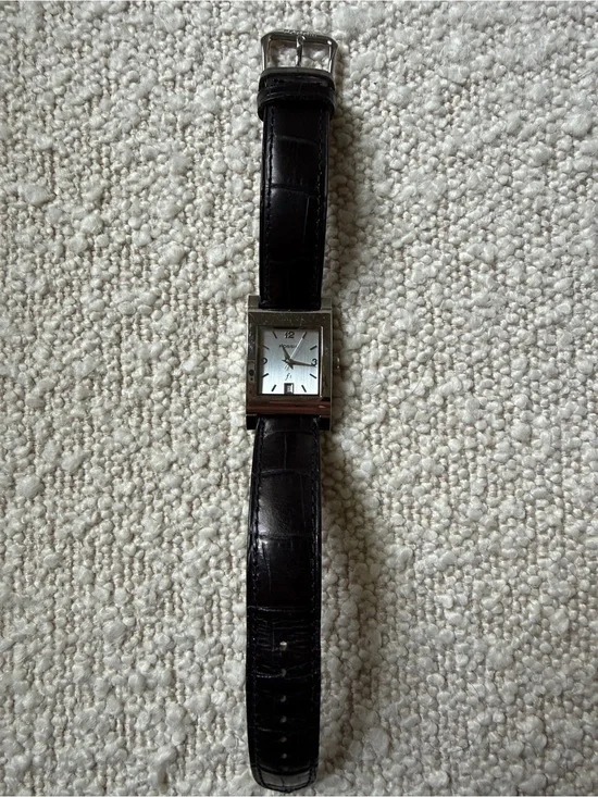 Fossil women’s watch. Silver face with new black croc leather strap.